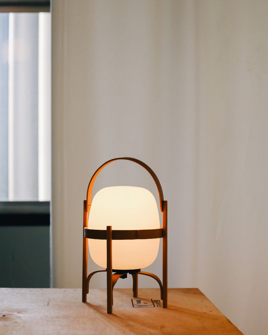 Cordless designer table lamp with long battery life and dimming