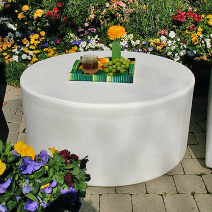 La Fete Design Furniture Puck Round Ottoman at MetropolitanDecor.com